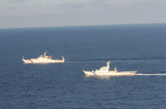 A patrol vessel watches Chinese government vessel