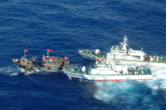 Patrol vessels control vessel carrying activists, who make a claim about territorial rights from their own perspective